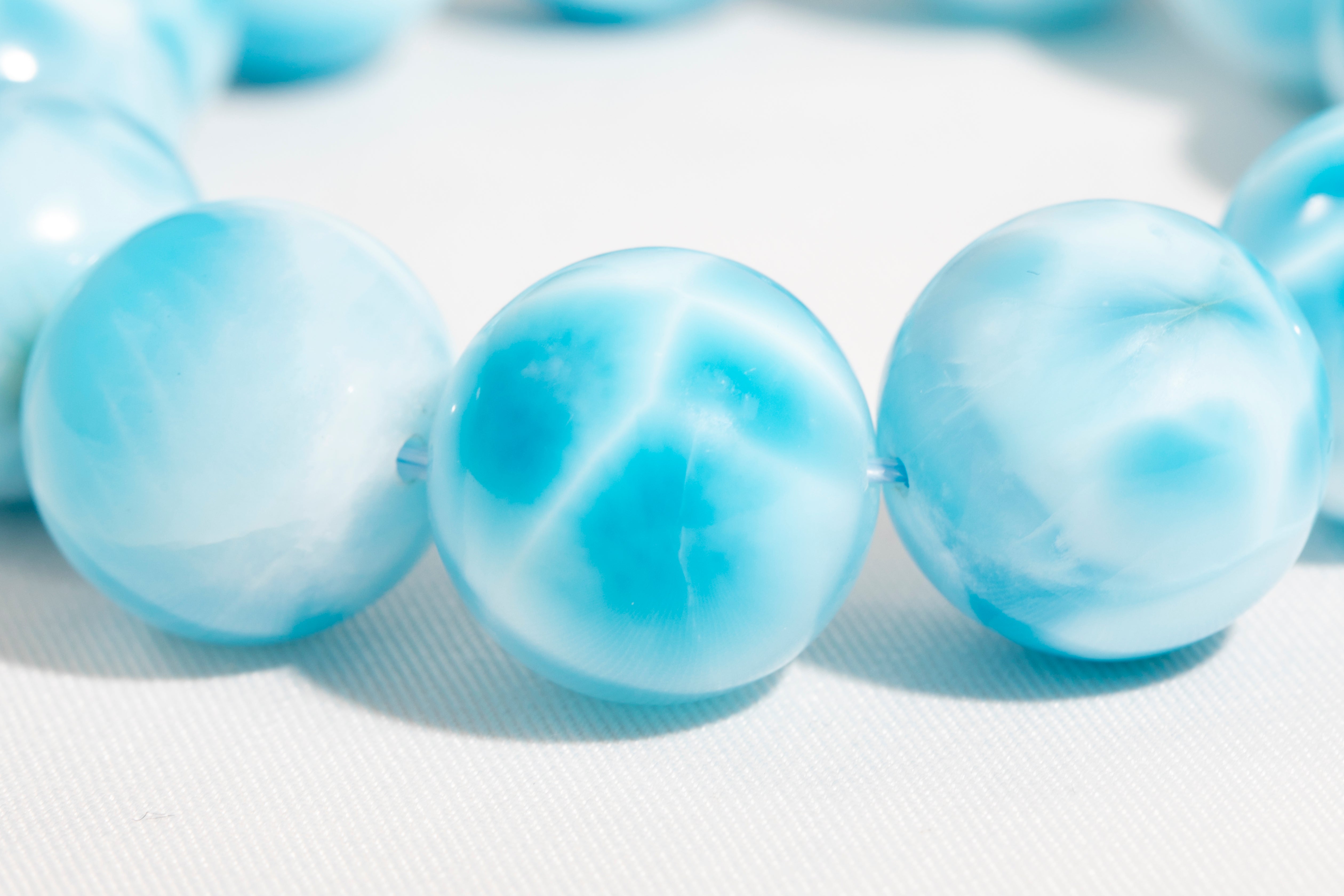 透き通るブルー はっきり波模様 ハイクオリティー ラリマー 予約]バイカラー透かし編みノースリーブプルオーバー/ミックス